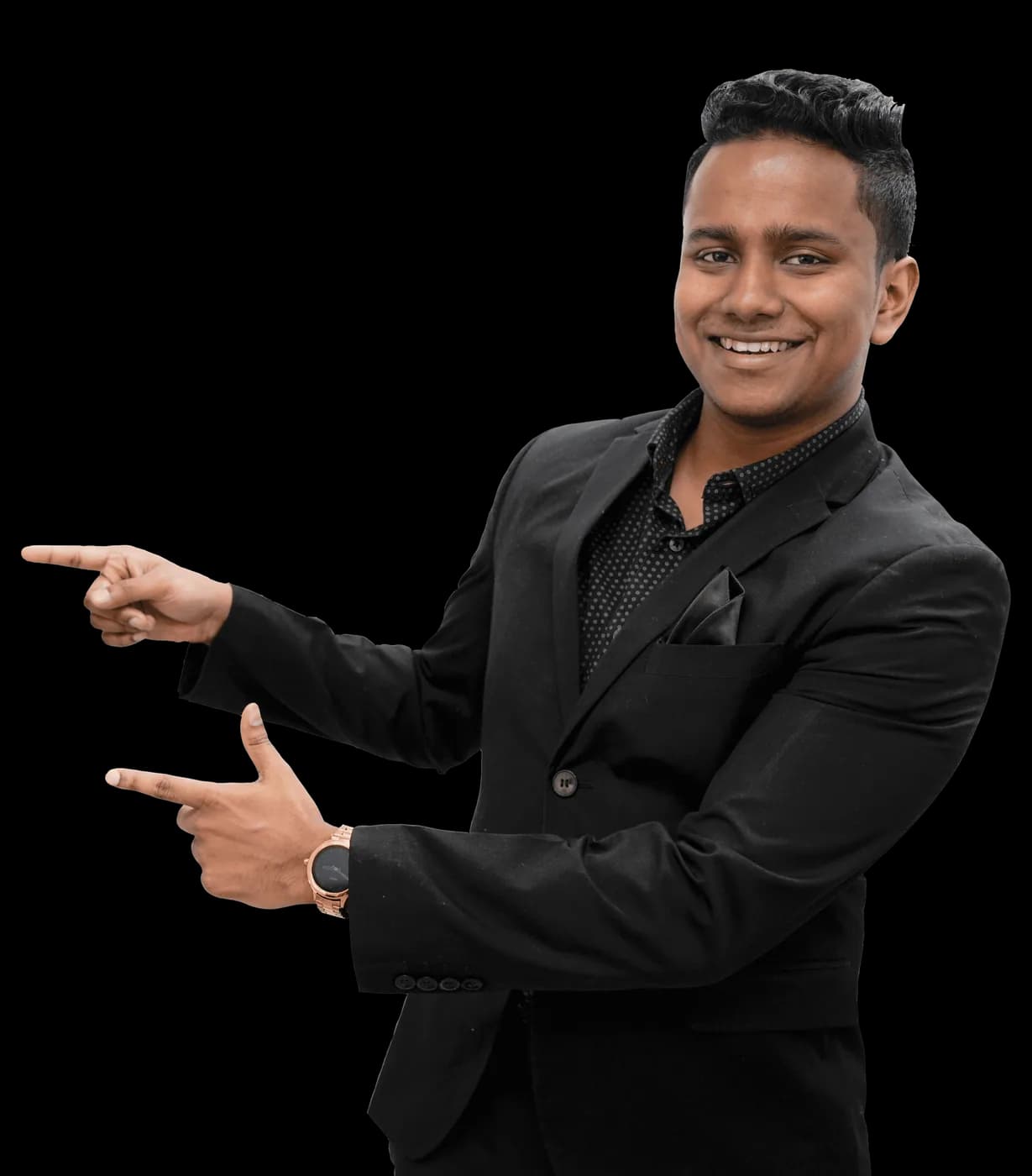 Shorupan Pirakaspathy in a black suit, pointing
